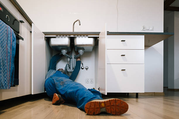 Professional Drain Cleaning technician working in Lexington, IL